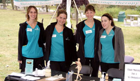 Tracey Beaugrand, Carrie Deslippe, Linda Brandie and Erin Flood perform chair massage at the 2010 Winner's Walk of Hope for Ovarian Cancer