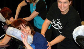 Carrie Deslippe massages Jenny Ingratta at the 2010 Dancing with the Local Stars fundraiser