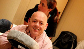 Mike Foster, a 2011 DWLS judge, enjoys a chair massage.